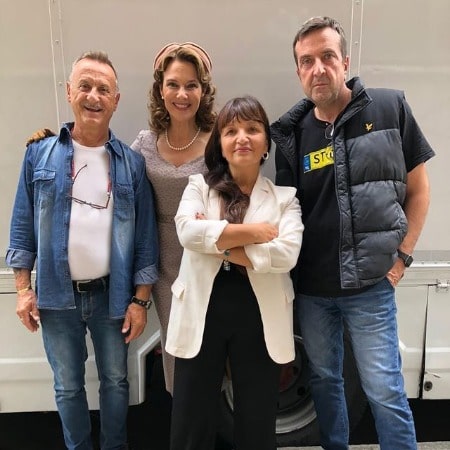 Picture of Valeria Cavalli a with her crew for one of her TV series.